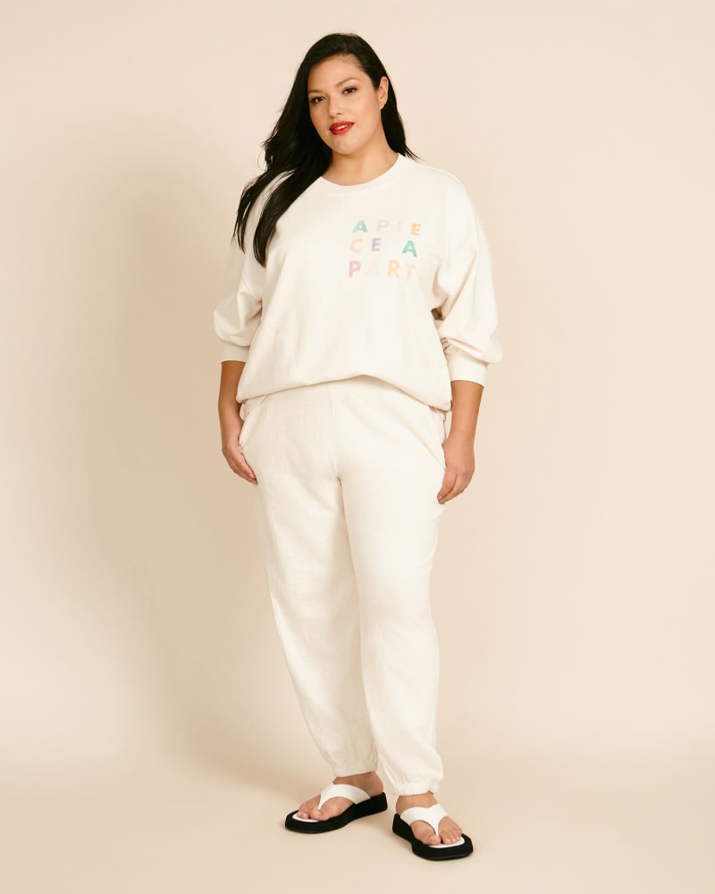 Front of a model wearing a size 2XL Dinas Jogger in Cream by Apiece Apart. | dia_product_style_image_id:219177